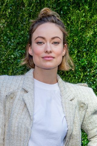 Olivia Wilde wears her bob in a half-up style as she attends Through Her Lens: The Tribeca Chanel Women's Filmmaker Program Luncheon at Locanda Verde on October 17, 2017 in New York City