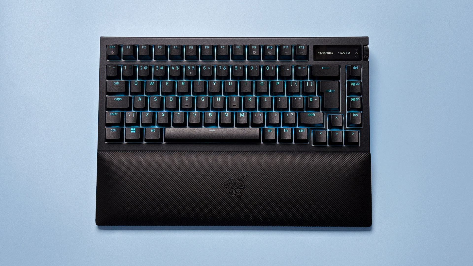 Razer BlackWidow V4 Pro 75% keyboard from various angles on a light blue background