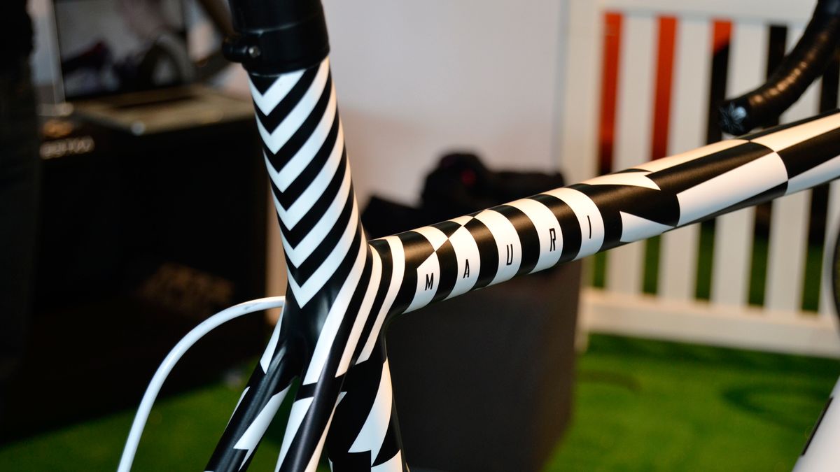 This bike is called the Mauri, which explains the inspiration for the paintjob, which was all masked and painted by hand. It took a week