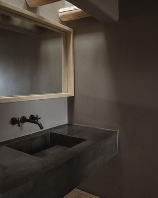 A brown textured bathroom