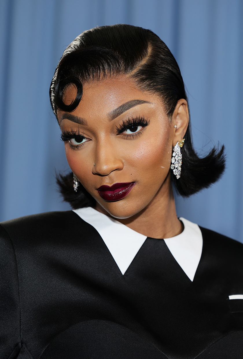 Angel Reese with victory rolls hairstyle at Met Gala 2025