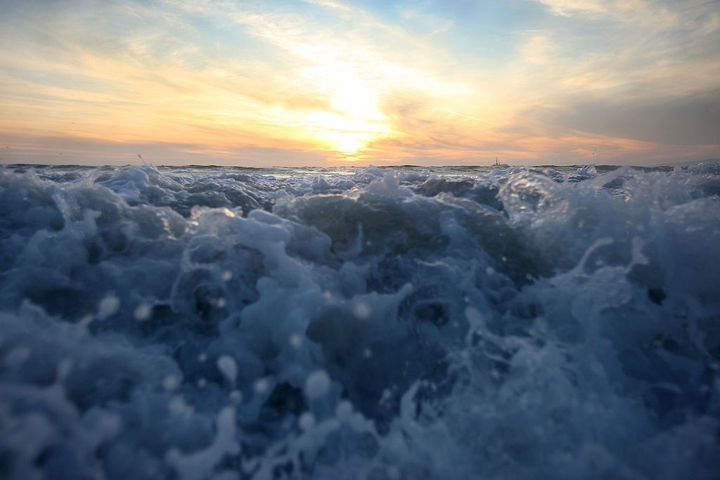 Waves break off the California coast.