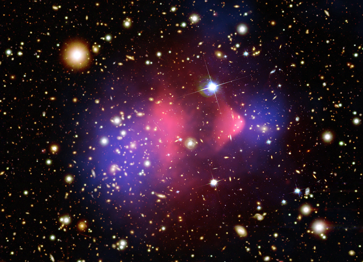 This composite image shows the galaxy cluster 1E 0657-56, also known as the "bullet cluster", formed after the collision of two large clusters of galaxies.
