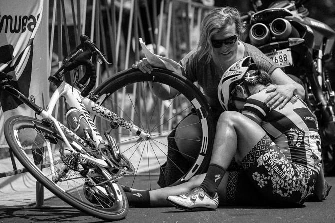 Carmen Small (Specialized-Lululemon) collapses after a tough day defending the jersey