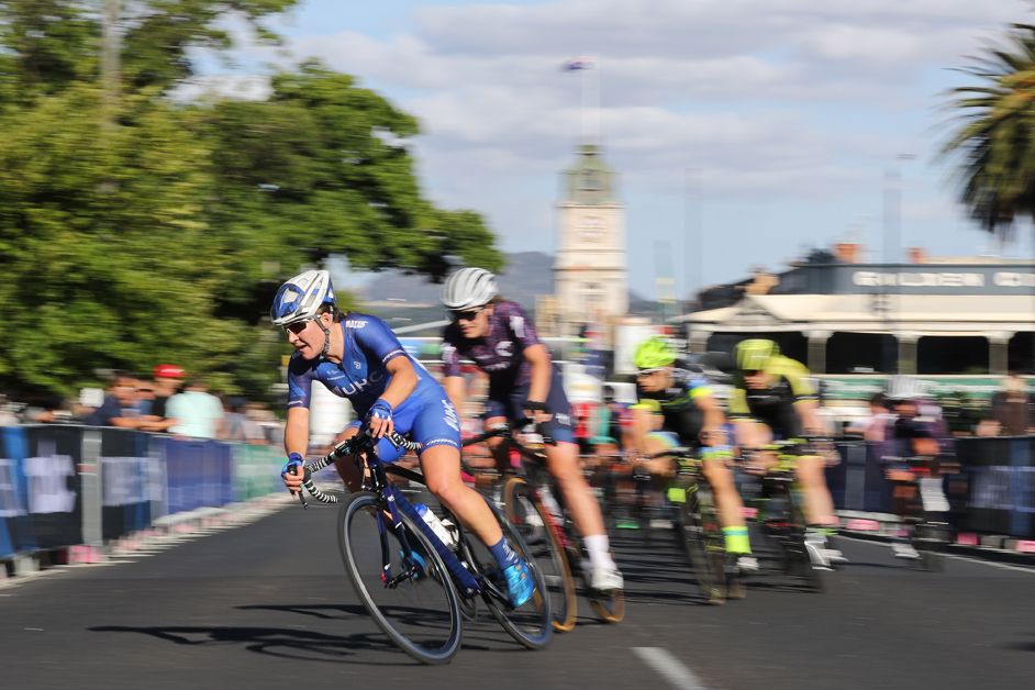 The riders take one of the many corners