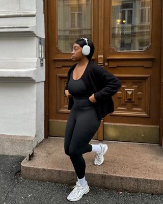 Nnenna Echem in black activewear.