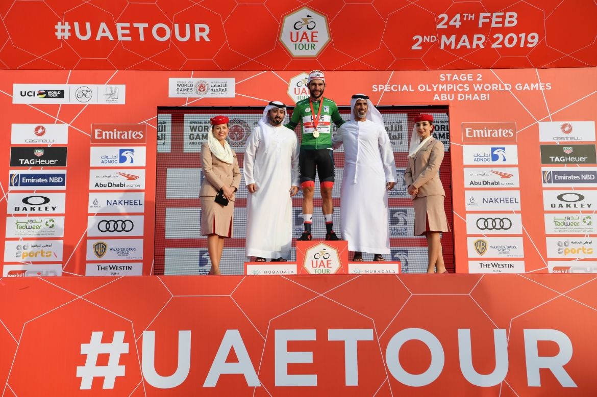 Fernando Gaviria (UAE Team Emirates) is presented with the points jersey