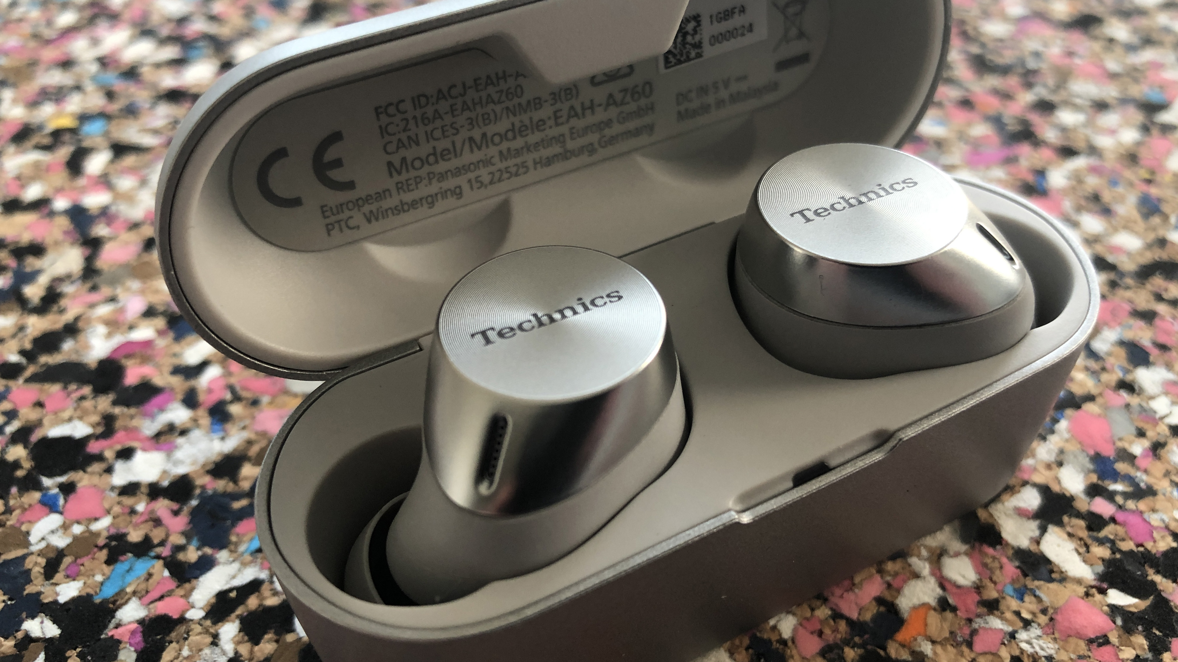 the technics eah-az60 true wireless earbuds in their charging case