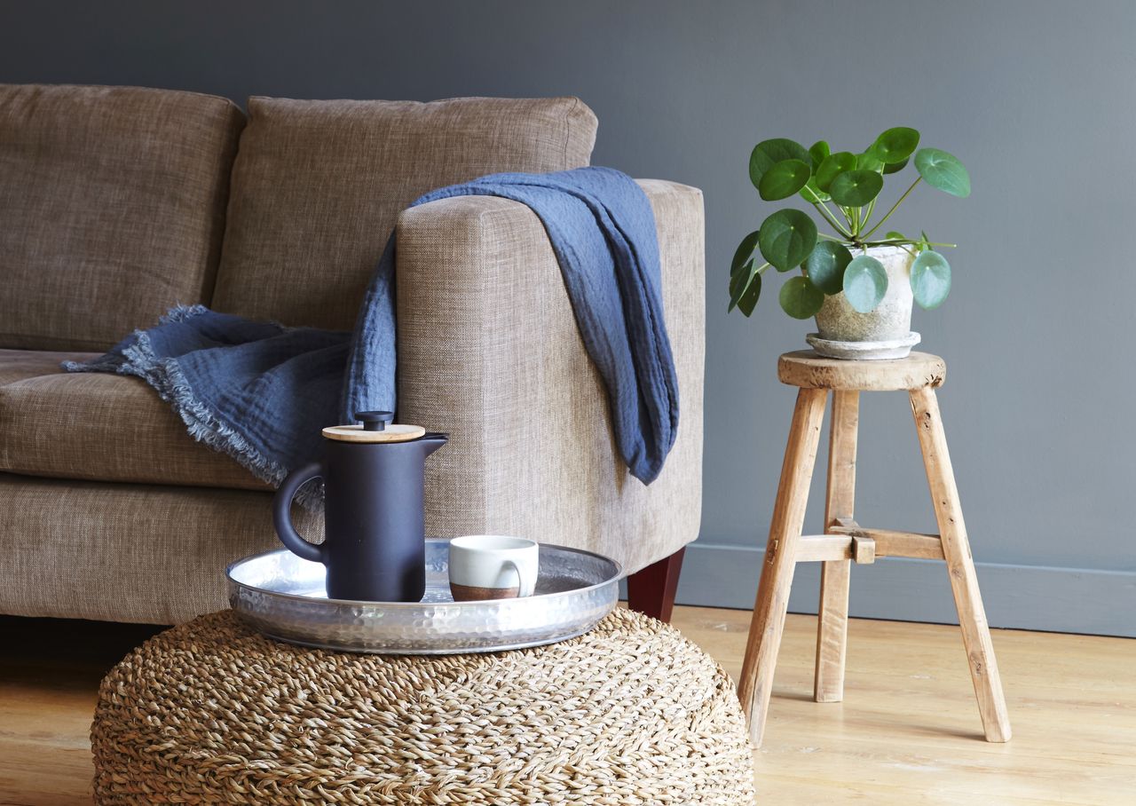 A rattan floor seat in a living room