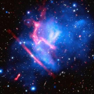 Pictured here is one of the most complex and distorted galaxy clusters known in the universe. This galaxy cluster is named MACS J0717 and is located about 5.4 billion light years away from Earth. MACS J0717 is the site of a collision between four clusters