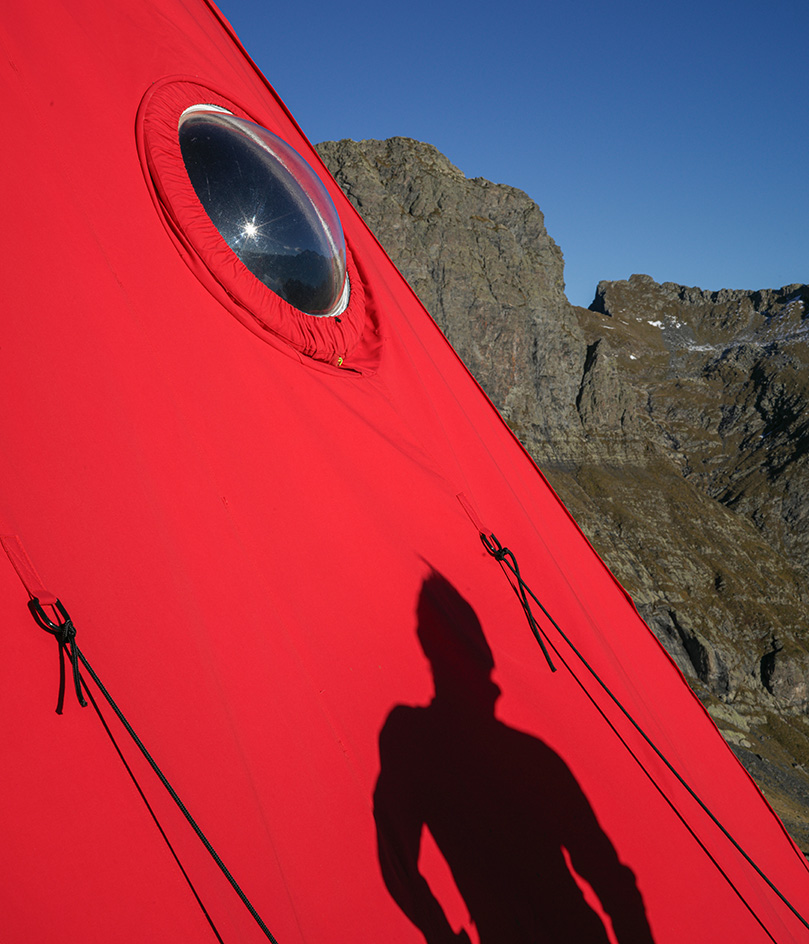 Aldo Frattini Bivouac, a little red mountain shelter in the pre-Alpine regions of Italy