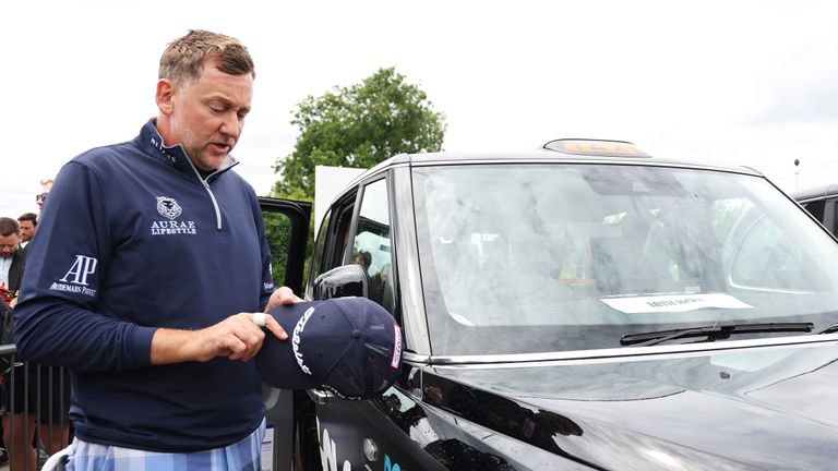 Ian Poulter pictured outside a London taxi