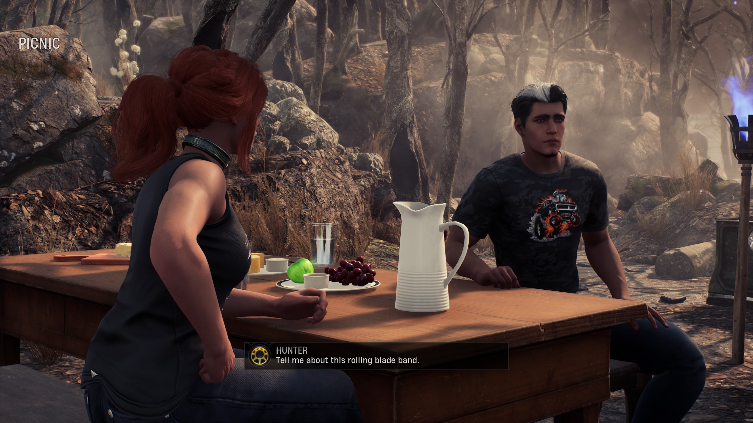 The Hunter and Ghost Rider sit at a picnic table. The Hunter says 