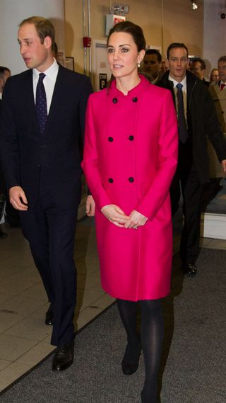 Kate Middleton in a bright pink coat