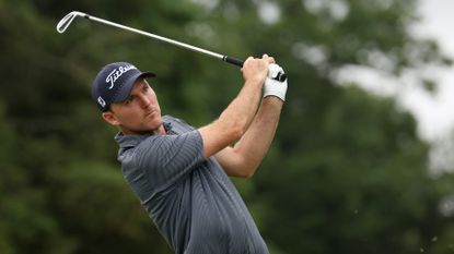 Russell Henley plays his shot from the fifth tee during the Travelers Championship.