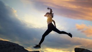 Woman running in mountains