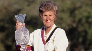 Kathy Whitworth with the Solheim Cup trophy after the 1990 Team USA victory