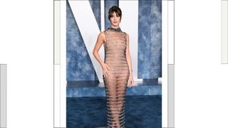 Daisy Edgar-Jones wears a silver rhinestone, sheer dress as she attends the 2023 Vanity Fair Oscar Party hosted by Radhika Jones at Wallis Annenberg Center for the Performing Arts on March 12, 2023 in Beverly Hills, California.