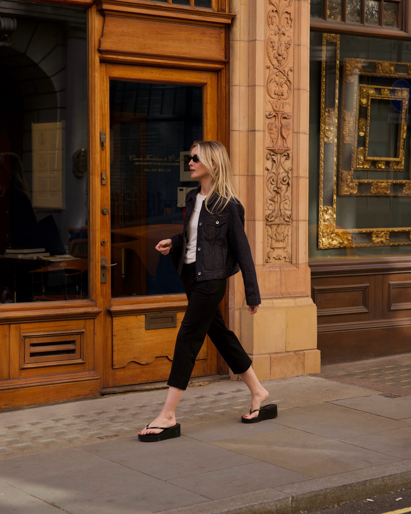 Chloe in capris and wedge flip-flops