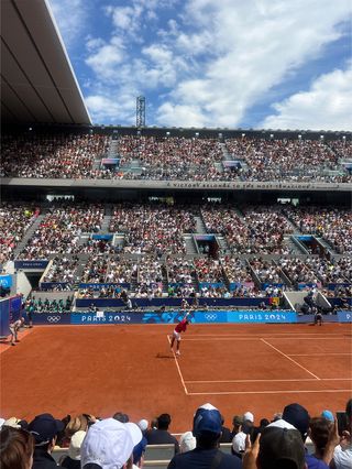 Rafael Nadal playing tennis at the Olympics.