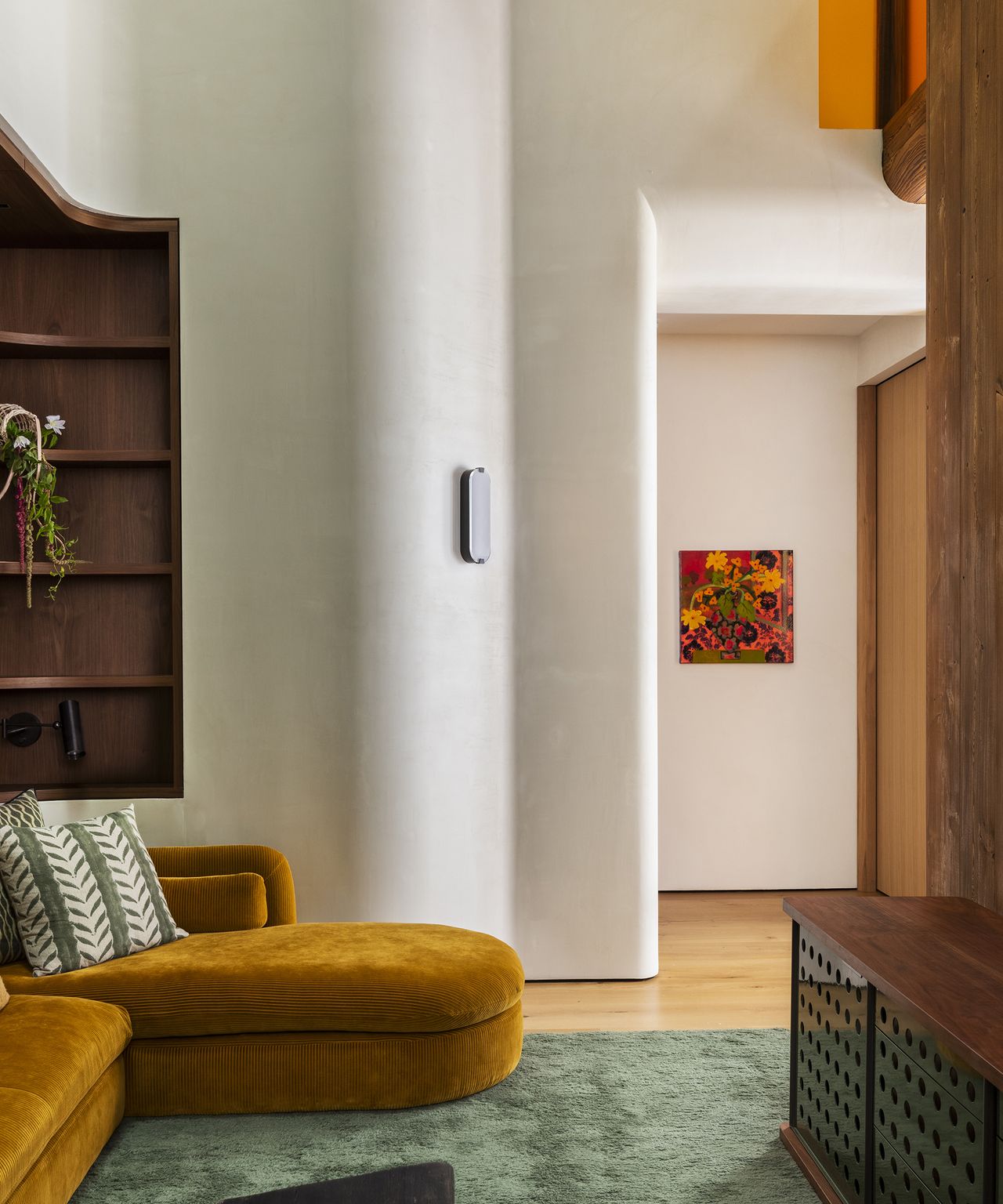 living room with limewash walls and yellow sofa