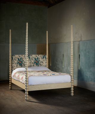 Bobbin bed by Julian Chichester in a dark painted bedroom