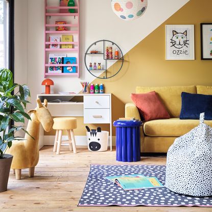 living room with sofa and wooden flooring