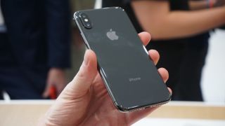 The iPhone X is also clad in glass, but less curvy