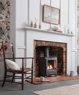 black bioethanol stove in brick fireplace with white mantle