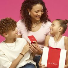 Mum getting given gifts for Mothers Day from H Samuel by her two kids