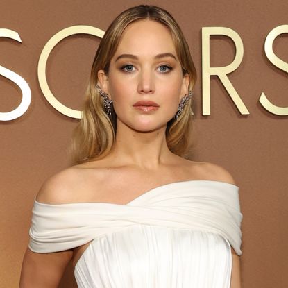 Jennifer Lawrence wore a custom white Dior dress at the 2025 Governors Awards