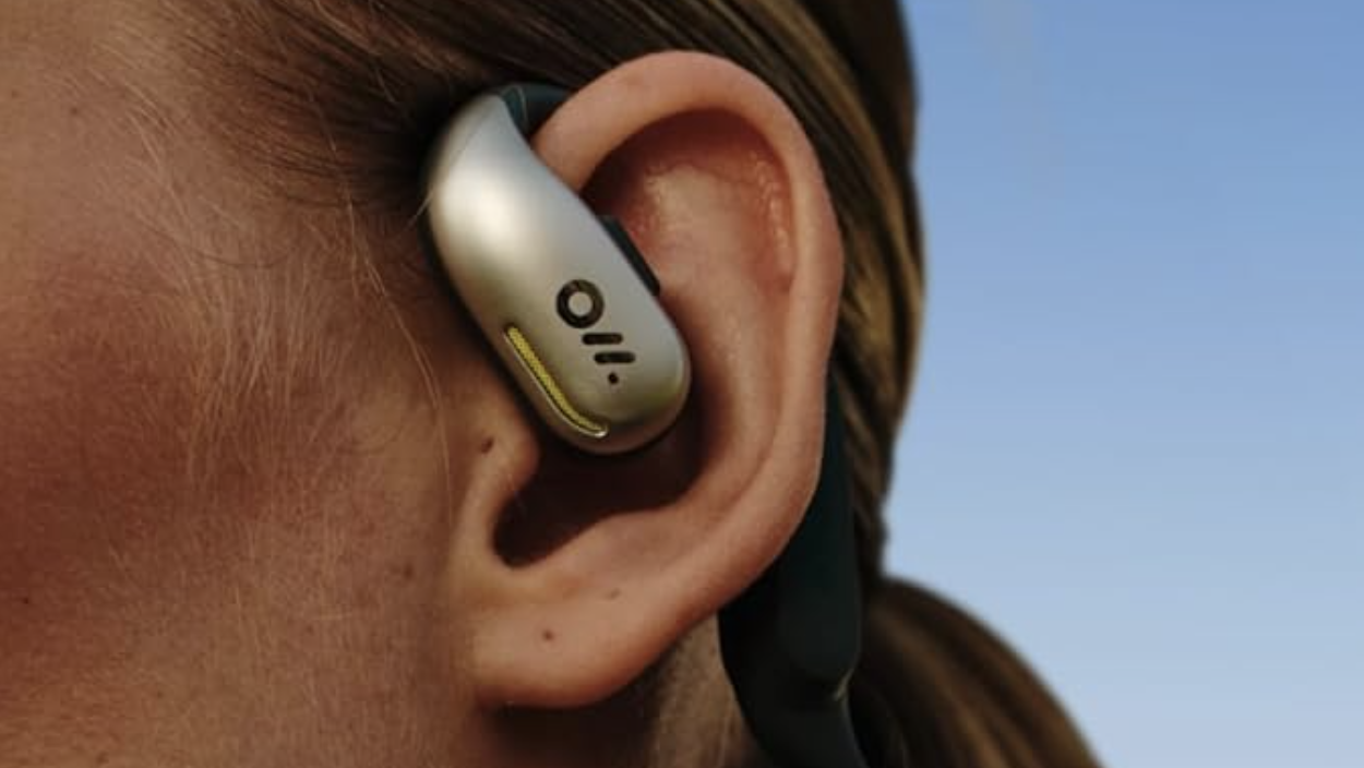Someone wearing the Oladance OWS Sports open ear earbuds
