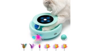 A fluffy grey cat pawing at the ORSDA Electronic Cat Toy