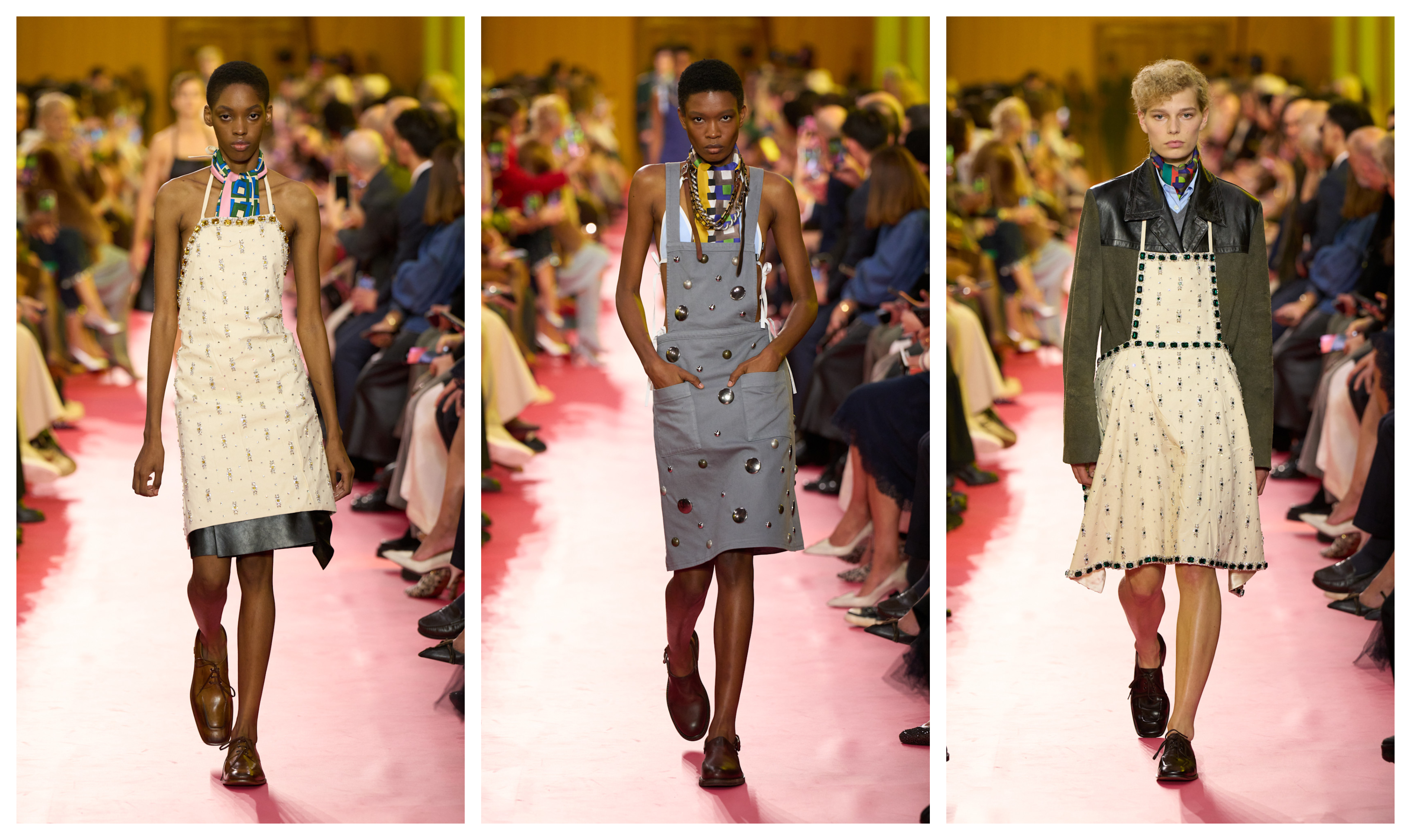 three models wearing apron dresses at Miu Miu&#039;s Paris Fashion Week runway