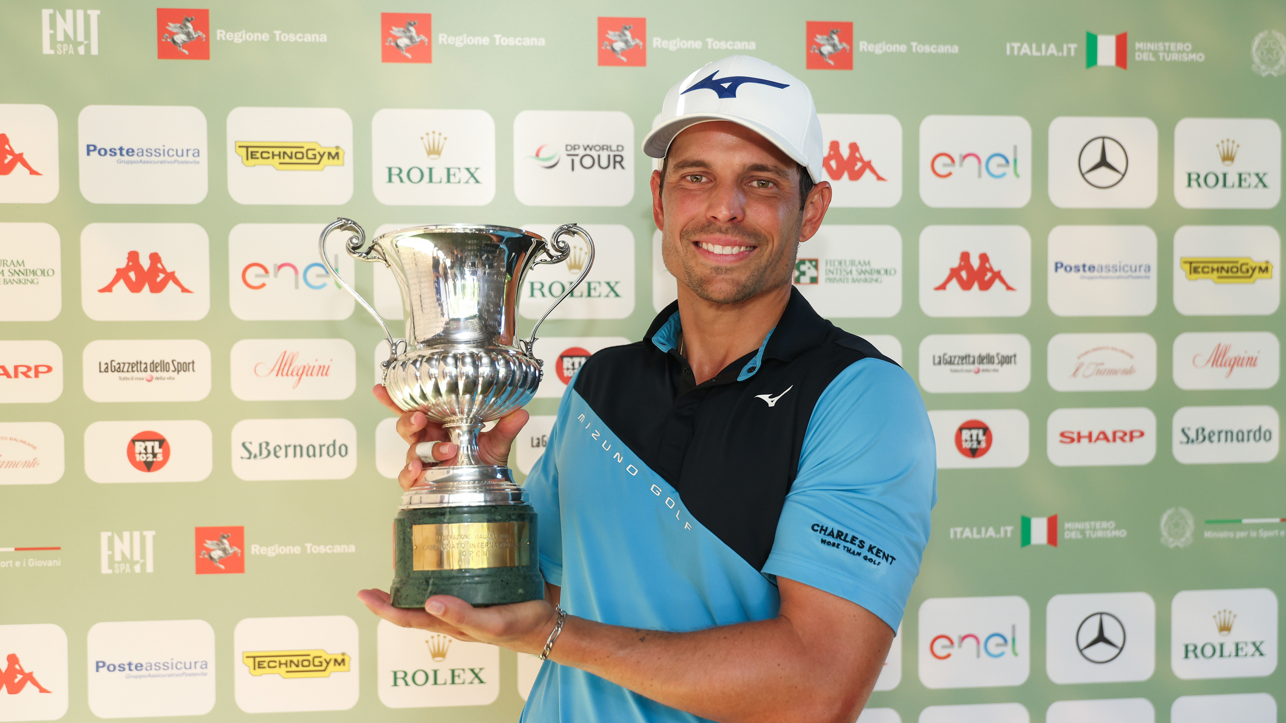 Adrien Saddier poses with the Italian Open trophy after winning in 2025