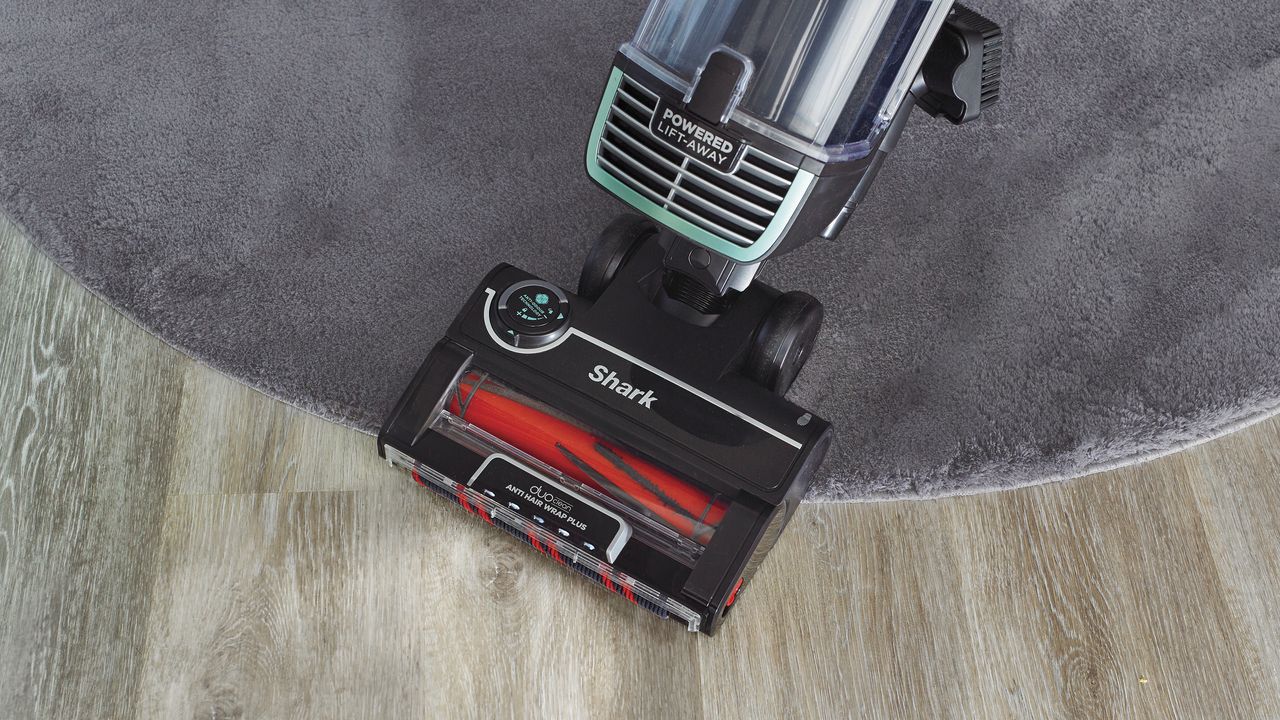 Shark vacuum on hard floor and rug