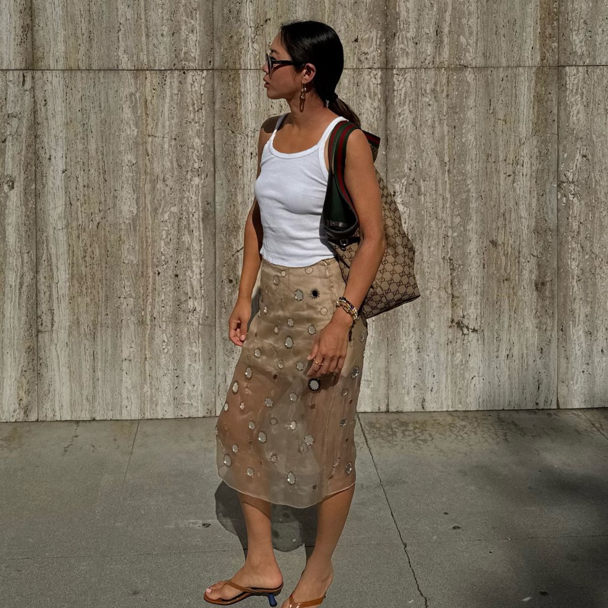 An image of @aimeesong wearing the silver sequin fashion trend.