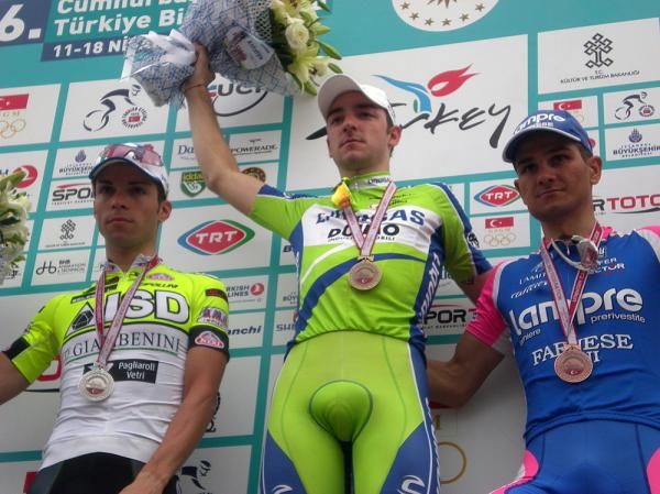 Visconti was still grumpy with Viviani on the podium, but Andr&eacute;a Grendene (Lampre) was pleased with third.
