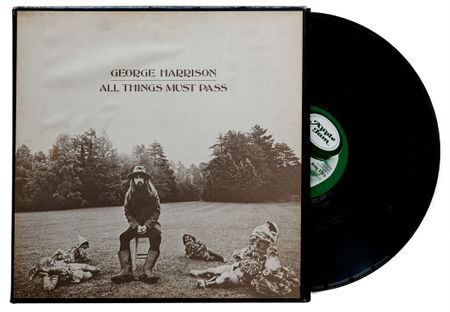 The cover of George Harrison's album All Things Must Pass, featuring the ex-Beatle in gnome-mode.