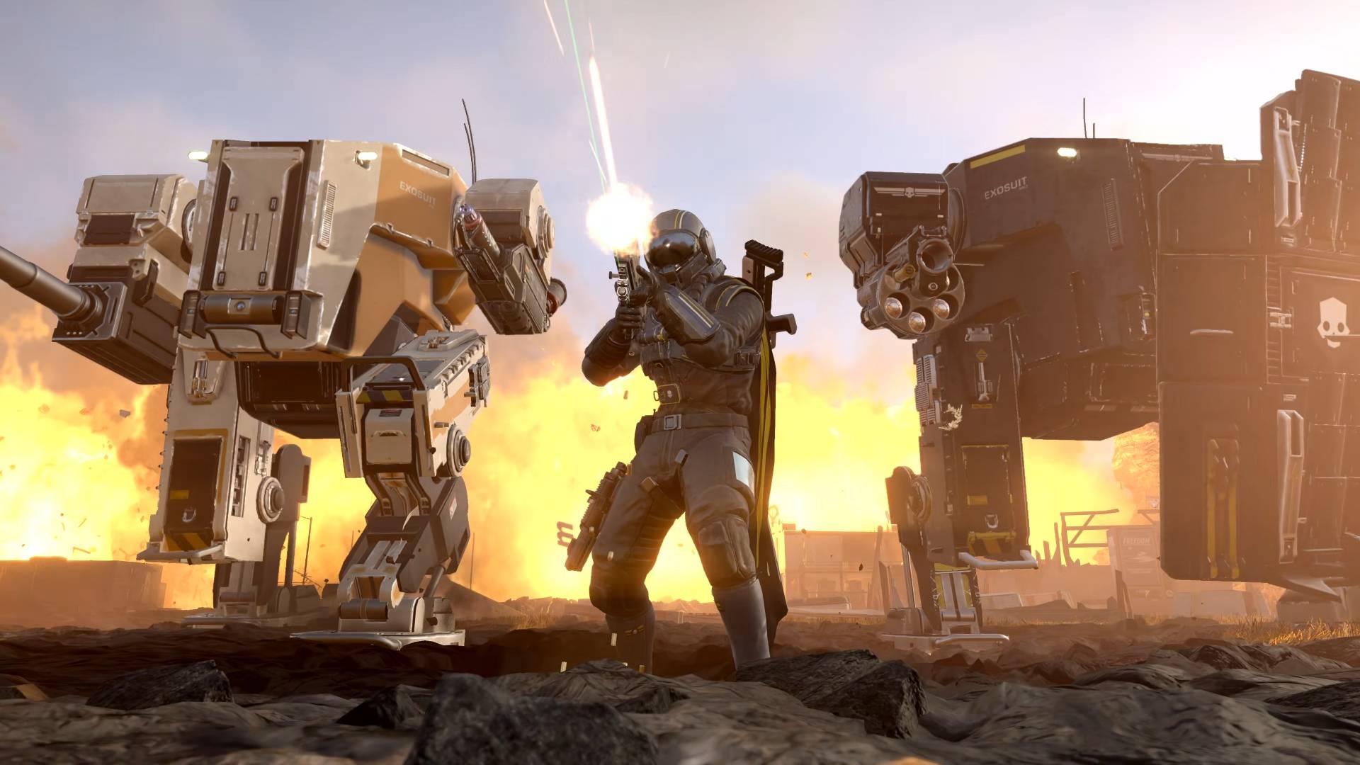 Helldivers 2 Exo Experts Warbond helldivers standing between lumberer and breakthrough mechs while firing Gallant SMG