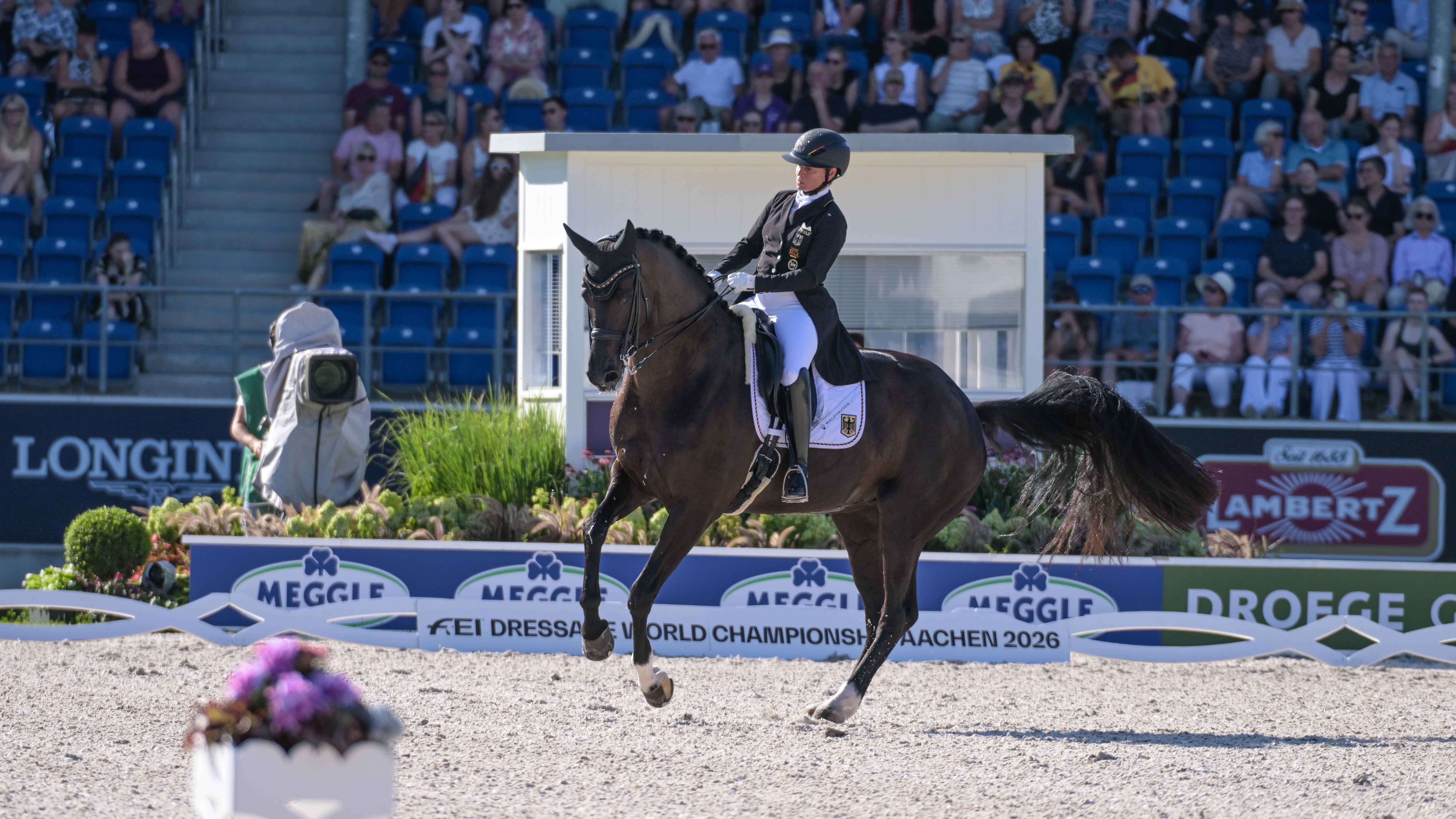 Isabell Werth riding a pirouette on Wendy De Fontaine in the grand prix at the 2026 Aachen World Dressage Championships