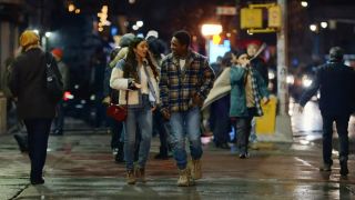 Dante Brown and Keana Marie walking and talking in Dash and Lily.