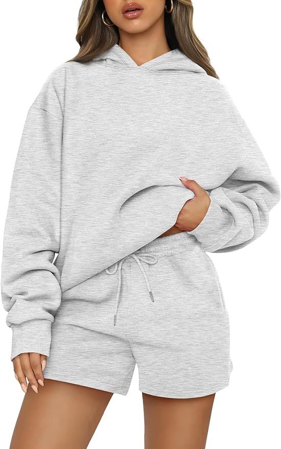 Model wears gray sweatsuit