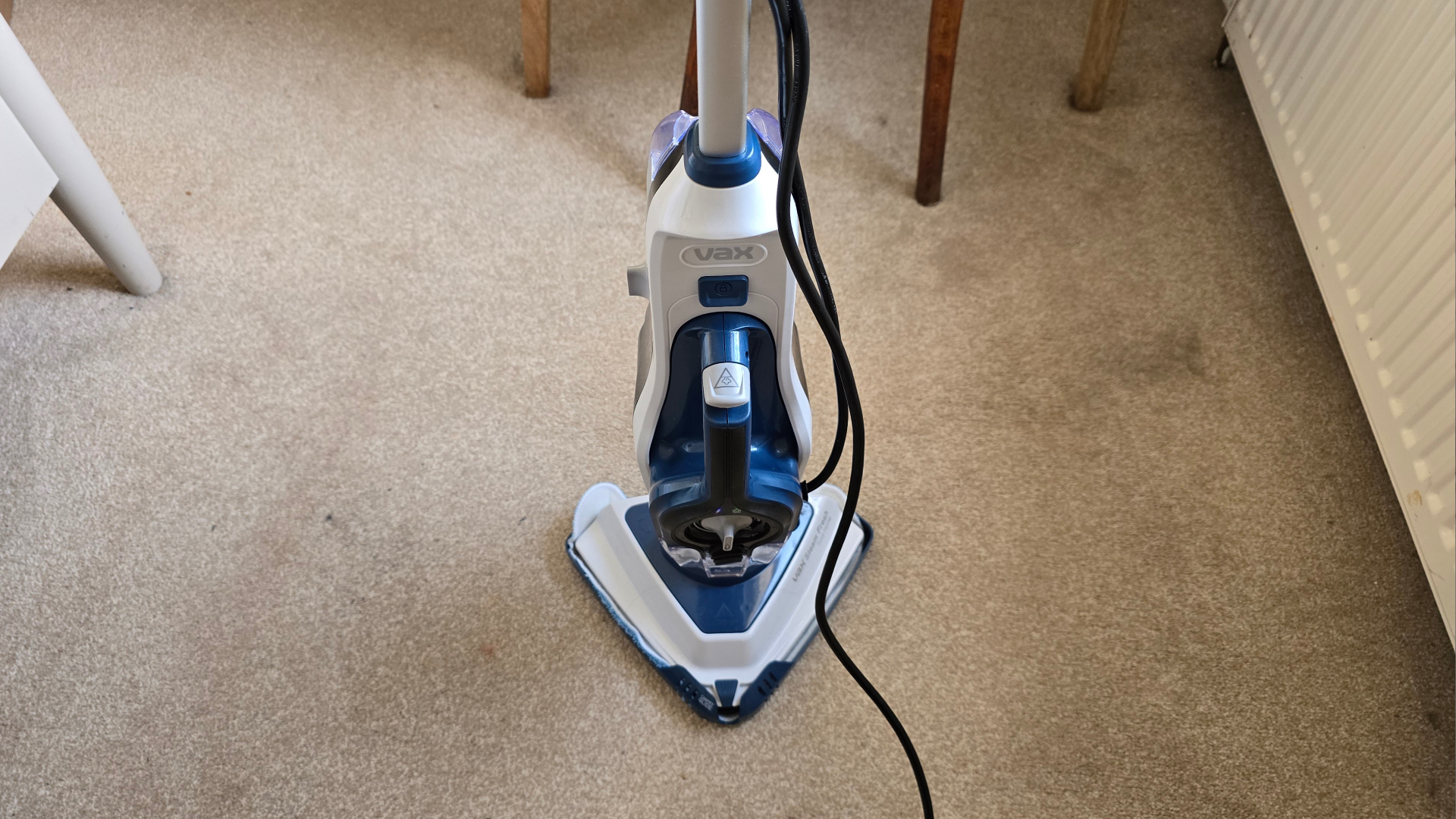 Vax Steam Fresh Total Home on dirty beige carpet