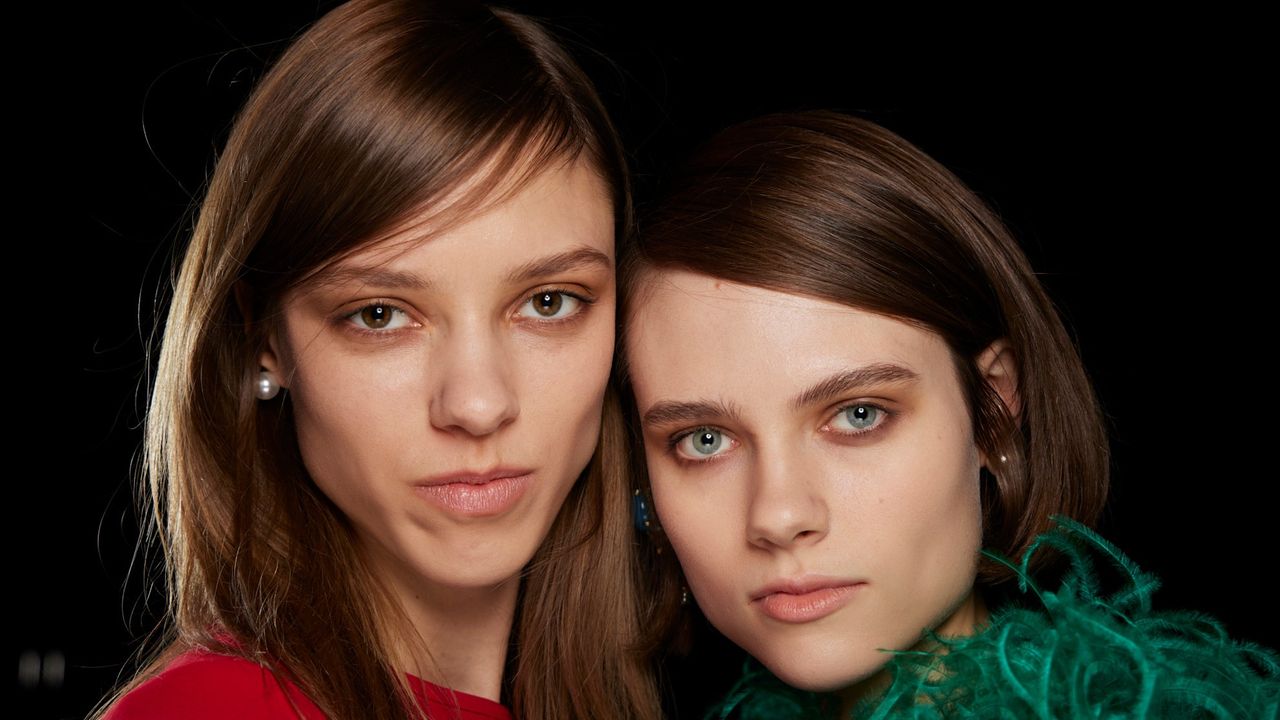 models with shiny hair from a hair gloss