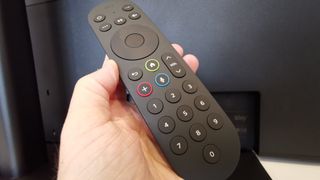 Someone holding the Sky Glass TV remote