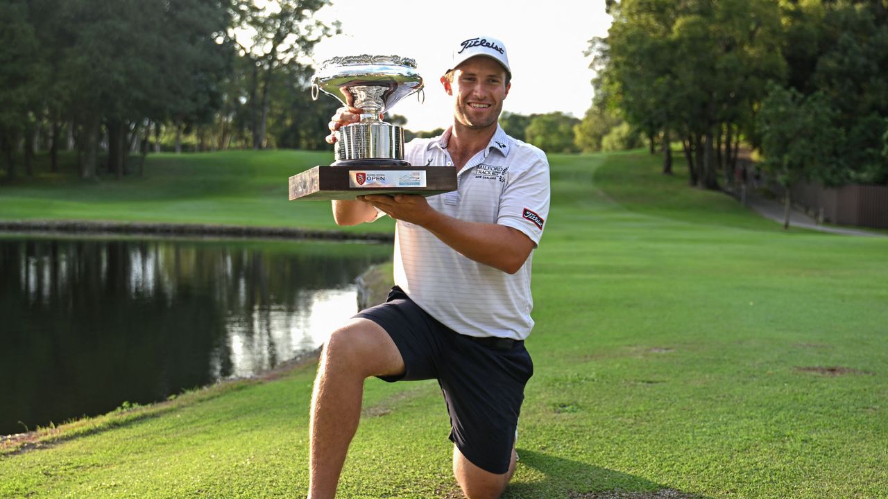 Ben Campbell holds the Hong Kong Open trophy in 2023