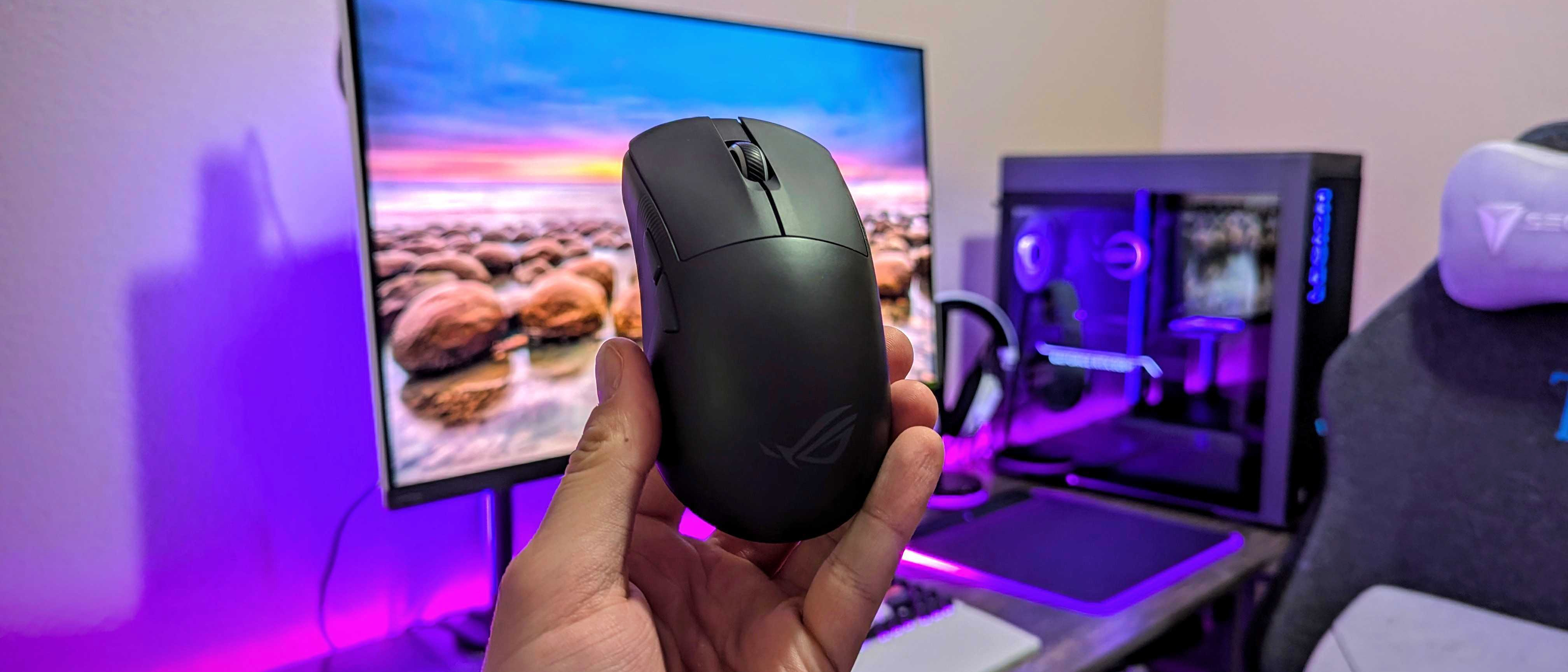 Image of the ASUS ROG Harpe Ace Mini wireless gaming mouse.