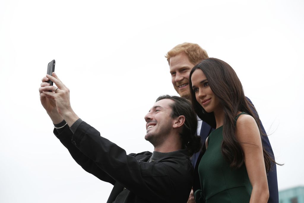 Waxwork figures of Prince Harry and Meghan Markle.