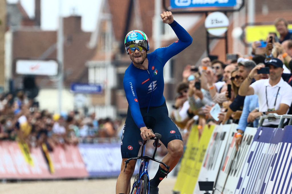 Italian Filippo Ganna of Ineos Grenadiers celebrates after winning during the time trial race 433 km from KnokkeHeist to Brugge as part of the Mens Elite as part of the UCI World Championships Road Cycling Flanders 2021 in Bruges on September 19 2021 UCI World Championships Road Cycling Flanders 2021 takes place from September 19 until September 26 2021 in several cities in the Belgian region of Flanders Belgium OUT Photo by KURT DESPLENTER BELGA AFP Belgium OUT Photo by KURT DESPLENTERBELGAAFP via Getty Images